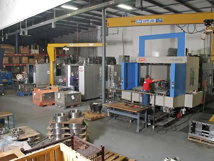 Stecker employee operating a CNC Machine