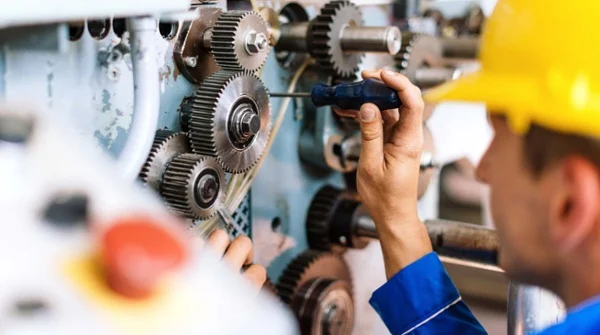 technician-fixing-gears-600
