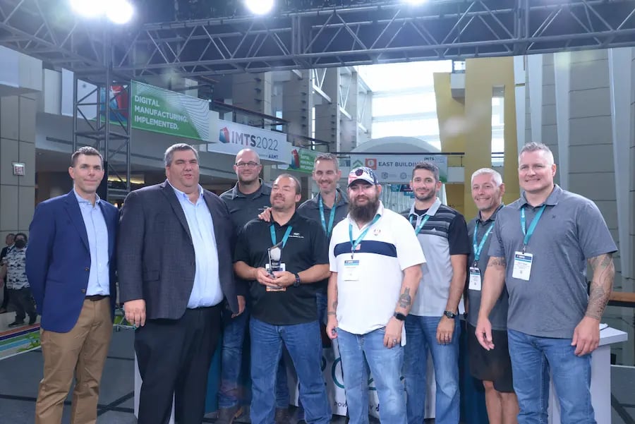 Stecker employees accepting award